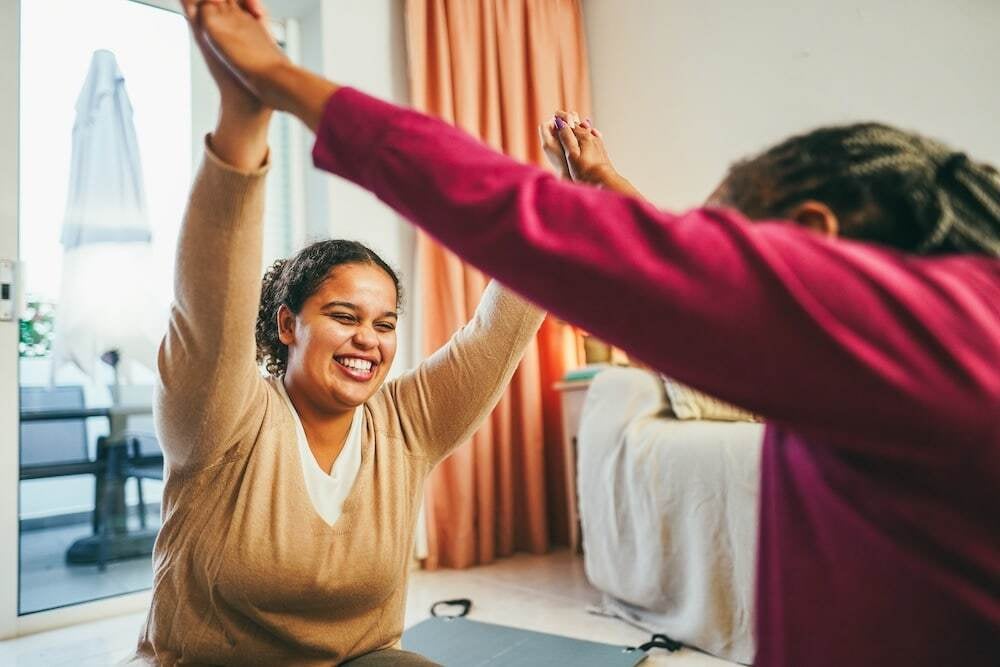 mother-and-daughter-doing-fitness-exercises-at-hom-2025-02-21-18-26-14-utc